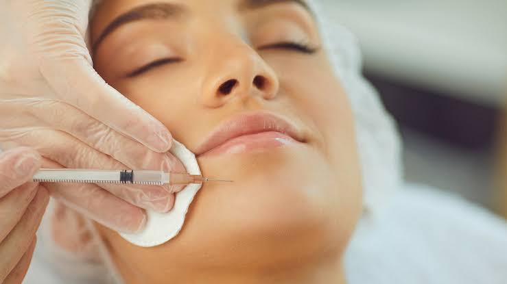 Chin filler treatment being performed step by step at an Oakville clinic
