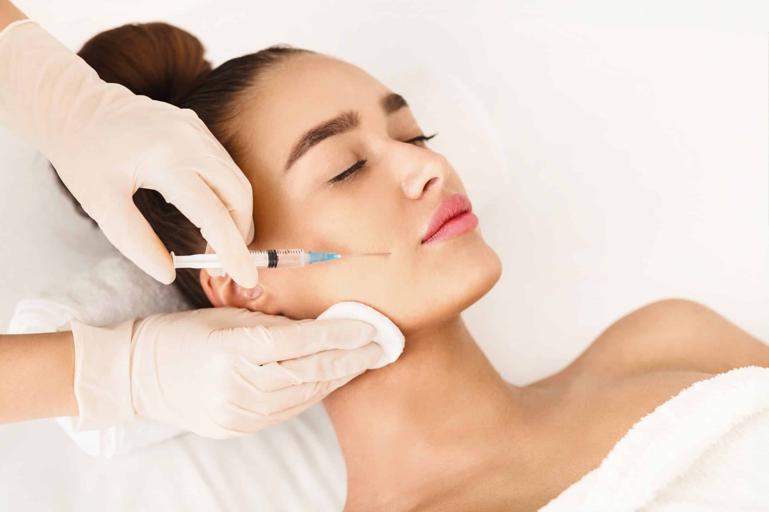 Woman with balanced, natural-looking facial proportions after facial balancing in Oakville