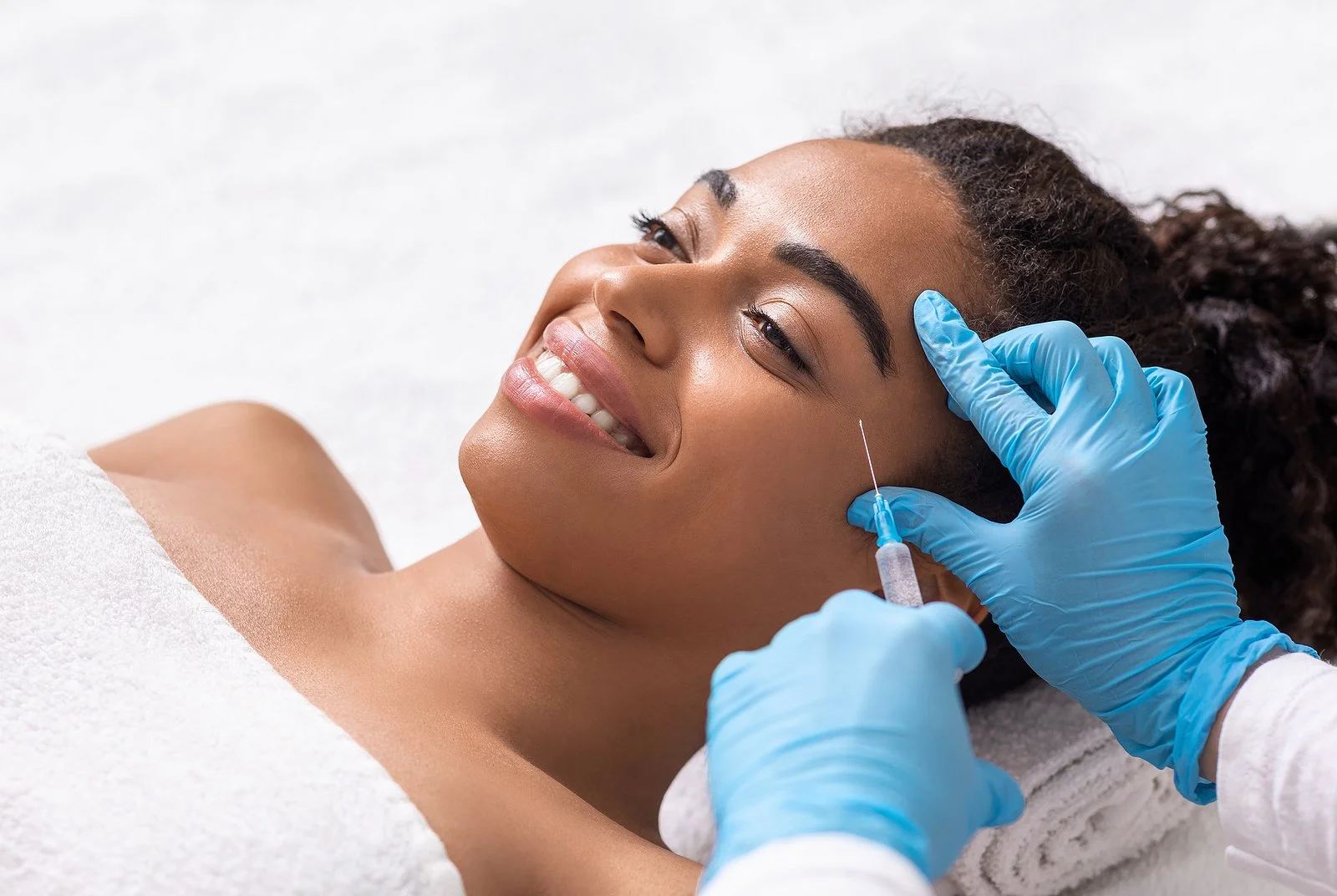 Facial balancing treatment being planned and performed at an Oakville clinic