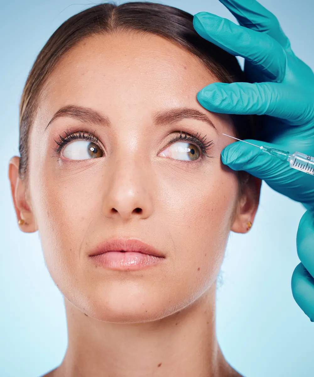 Botox being injected at the outer corner of the eye to soften crow's feet in Oakville