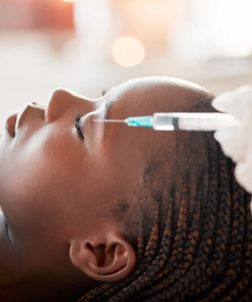 Crow's feet treatment being performed at an Oakville clinic