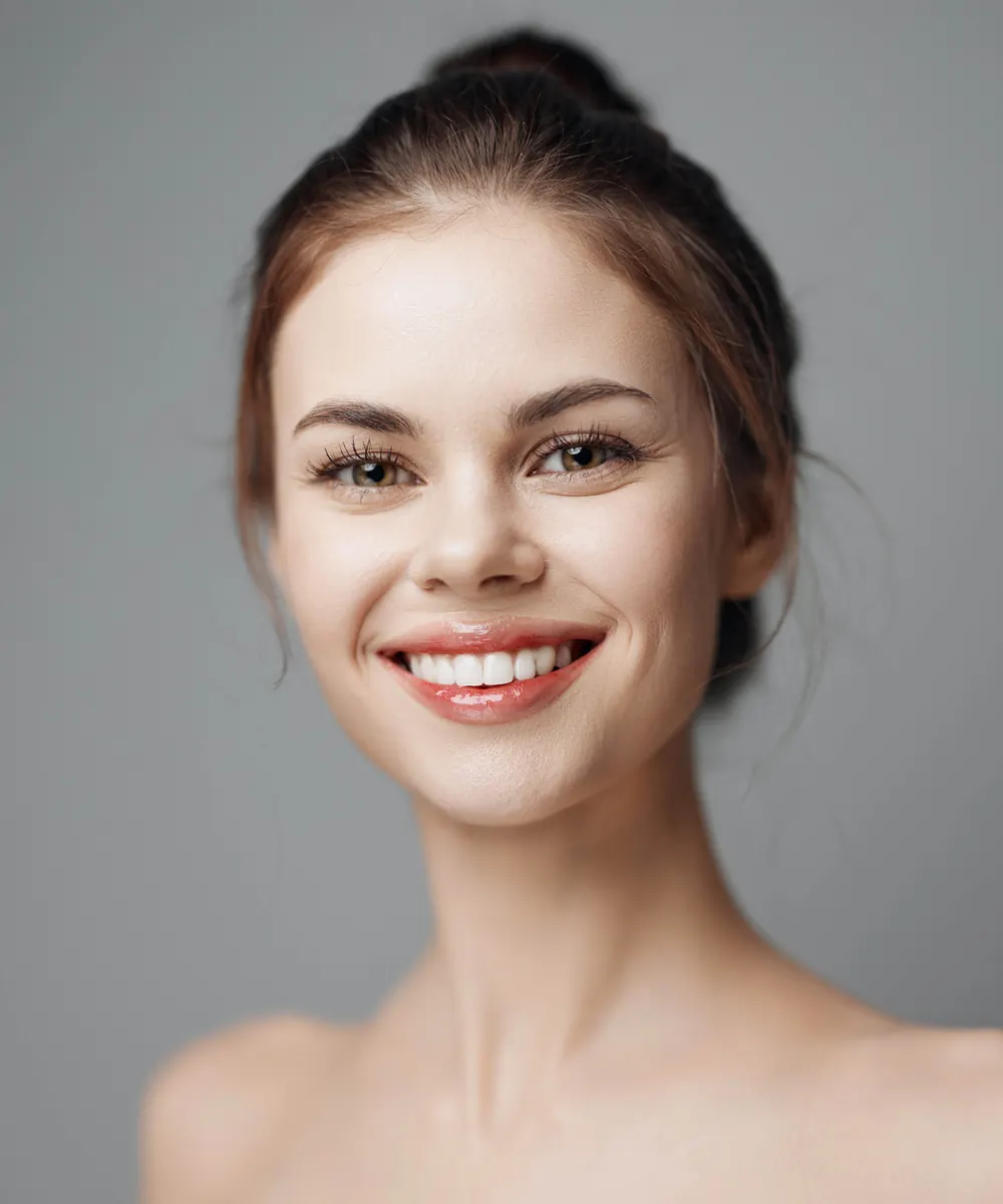 Woman with a balanced, confident smile