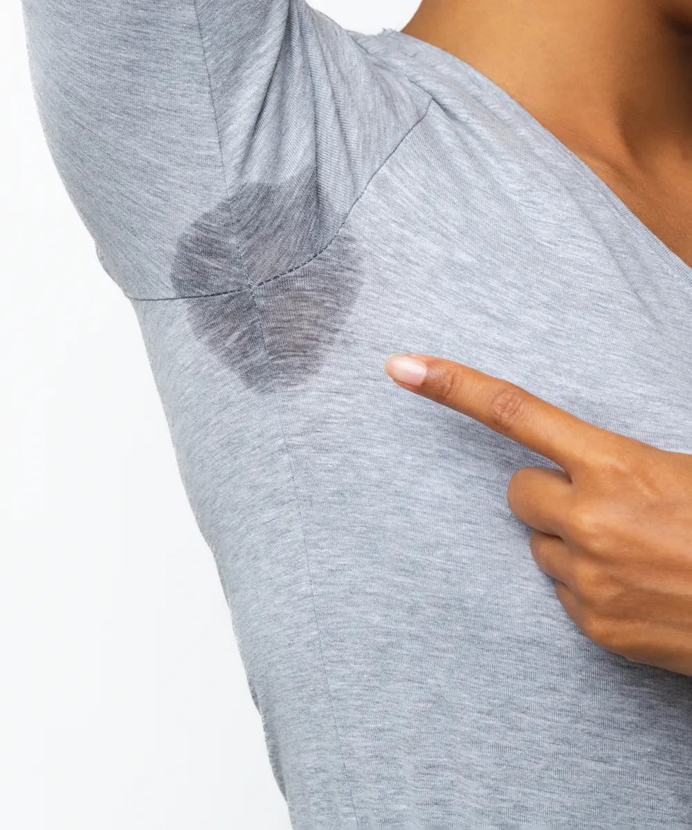Underarm sweat marks on a shirt, the concern treated with Botox in Oakville