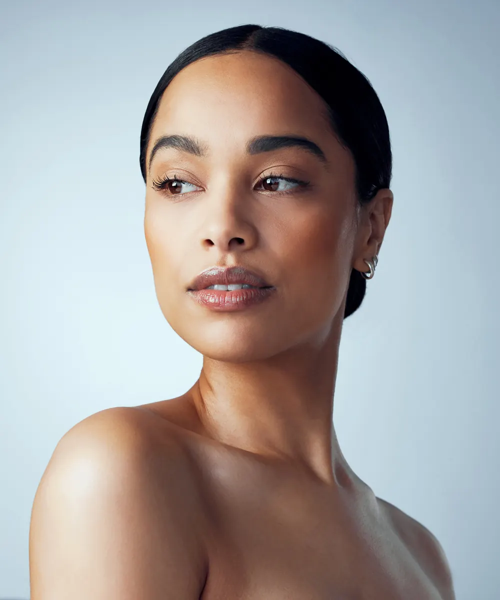 Woman's neck and shoulders, an area where skin quality changes often appear early