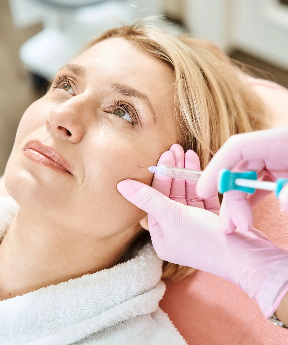Close up of smooth, well hydrated skin on a woman's cheek and jawline